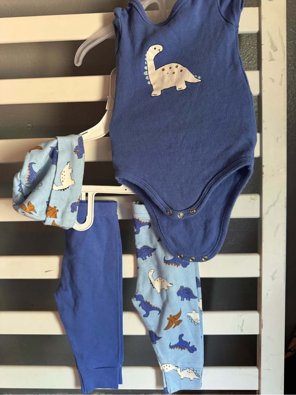 The Peanutshell blue Dino onesie with pants and a matching hat